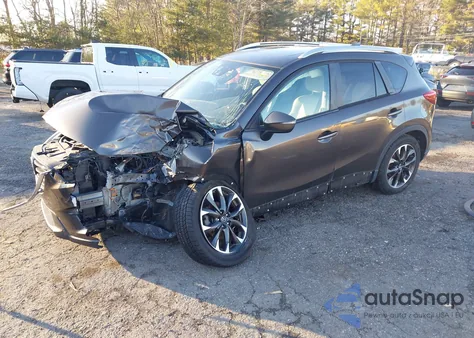 2016 Mazda Cx-5 Grand Touring z USA, uszkodzony, nr VIN JM3KE4DY9G0786190